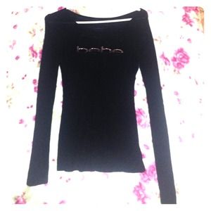 Black long sleeve bebe shirt. Heart cut out