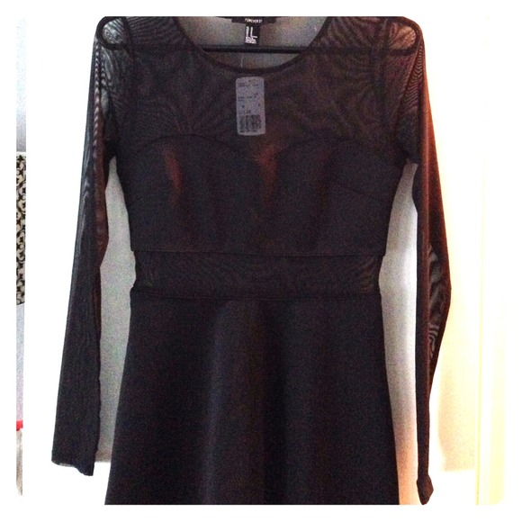 🔴SOLD🔴 NWT Sheer sleeve black dress.
