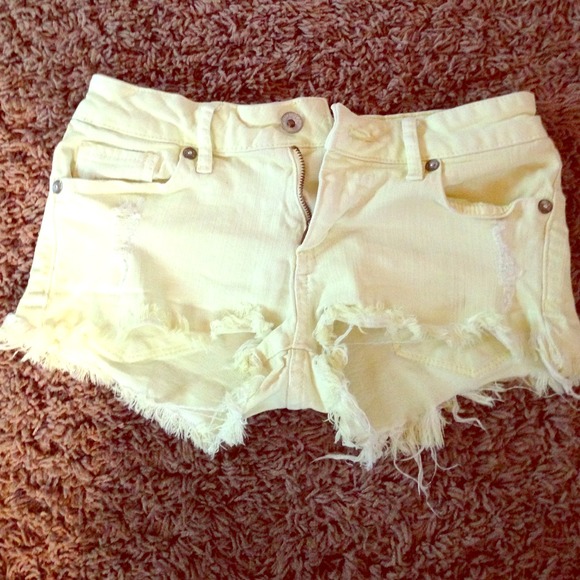 Daisy Duke yellow shorts.