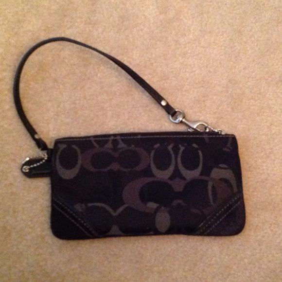 Signature Coach black wristlet