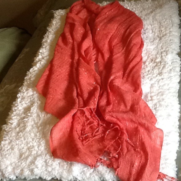 Metallic looking scarf.