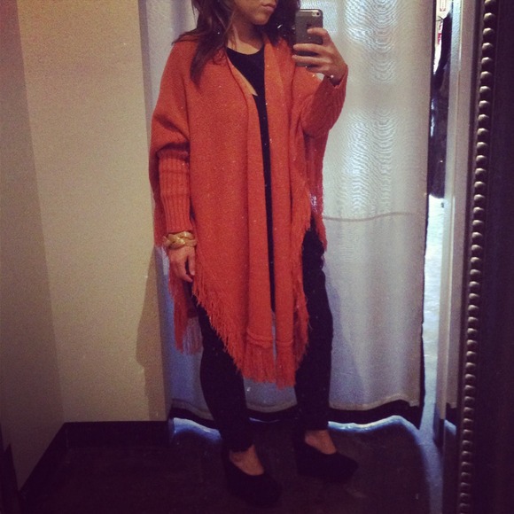 Orange fringe open sweater