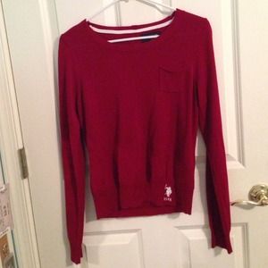 A cozy long sleeved red sweater!