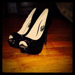 Black spiked high heels.