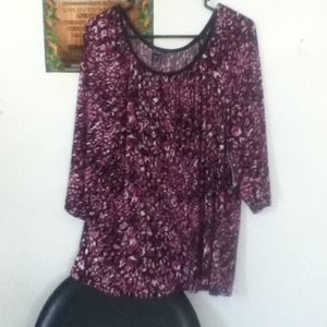 Purple White and black blouse .