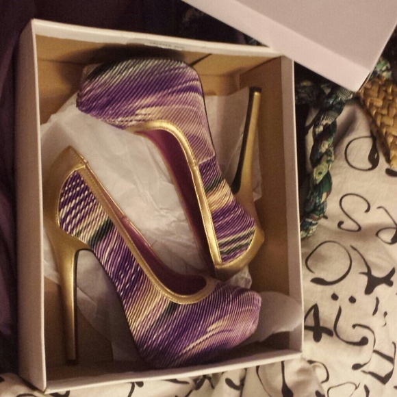 Gold and purple pumps