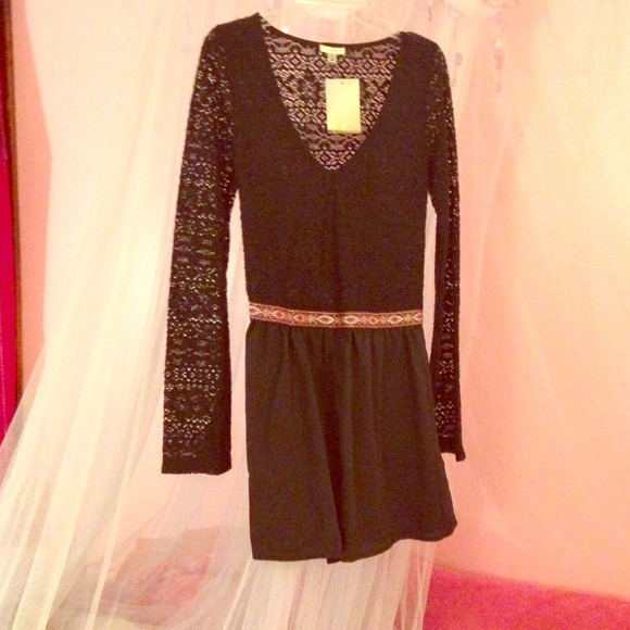 crocheted romper with pretty printed waistband