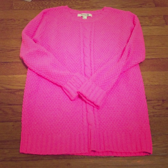 Vibrant pink cable knit sweater