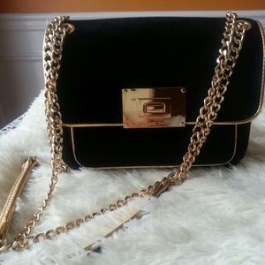 ALREADY SOLD OUT..MMichael Kros cross or handbag