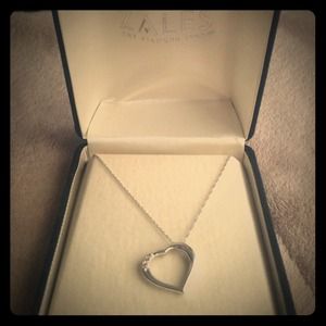 Heart necklace w/ three small diamonds from  ZALES
