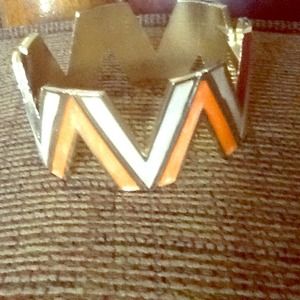 Creamsicle snap on bracelet.