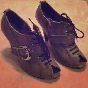 Gray lace up peep toe booties.