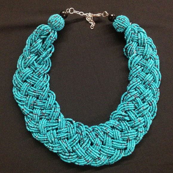 Stunning turquoise bead, braided necklace.