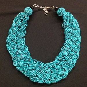 Stunning turquoise bead, braided necklace.