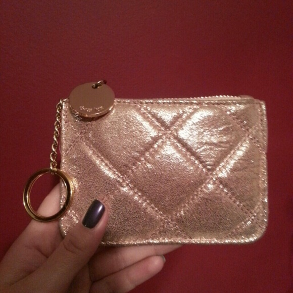 Rose gold colored coin purse