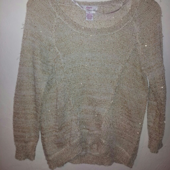 Gold sweater.