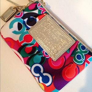 This is a bright Coach wristlet