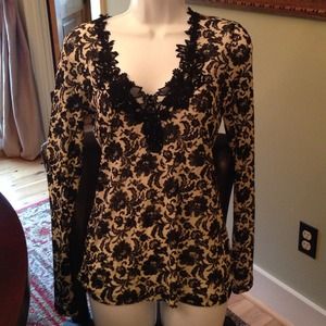 Karen Kane sheer top with lace. 100% Polyester.
