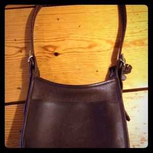 Coach brown leather saddle bag and matching wallet