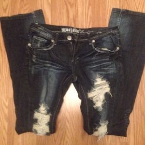Distressed dark wash jeans
