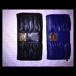 Authentic Michael Kors leather clutch