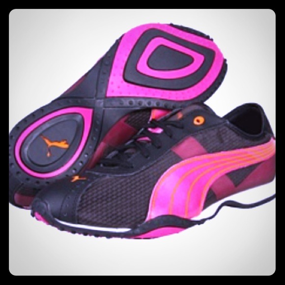 Pink and Black Puma Lillea cross training shoes.