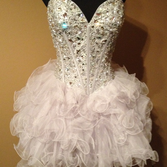 SOLD!!Sherri Hill size 4 with tags..silver