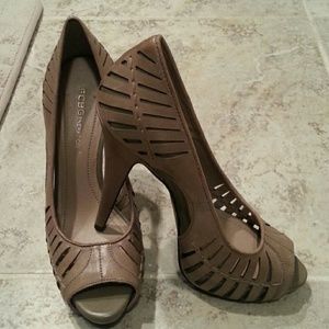 BCBG laser cut platform peep toe pumps
