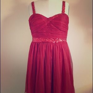 Red dress with sequin details.