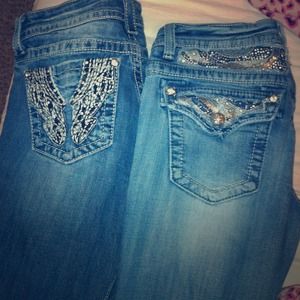 Two pairs of miss me jeans.