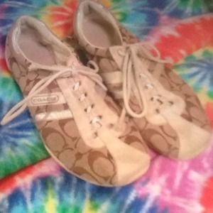 Size 8 1/2 cream and brown Coach shoes.