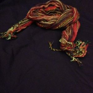 A great multicolored scarf with fringe trim