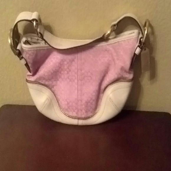 Authentic pink and gold coach handbag