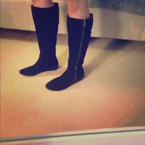 Black suede boots.