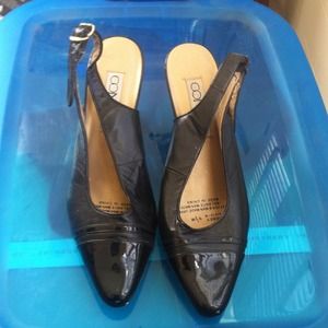 Black sling back pumps