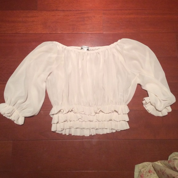 Cute ruffled cream blouse
