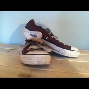 Brown Converse All Stars.