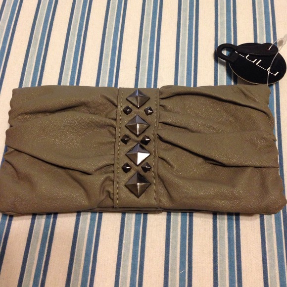 Stylish pocket book. New with tag