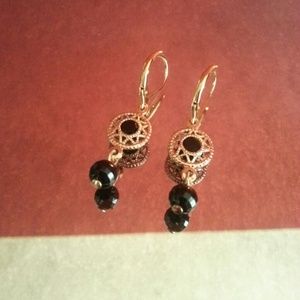 New black and gold earrings.