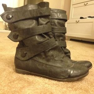 Black leather distressed boots.