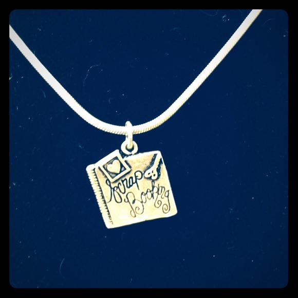 Sold: Silver necklace and  scrapbooking charm.