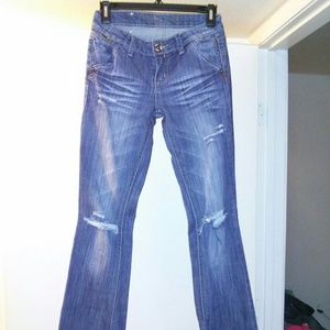 H & g blue torn bootleg jeans.