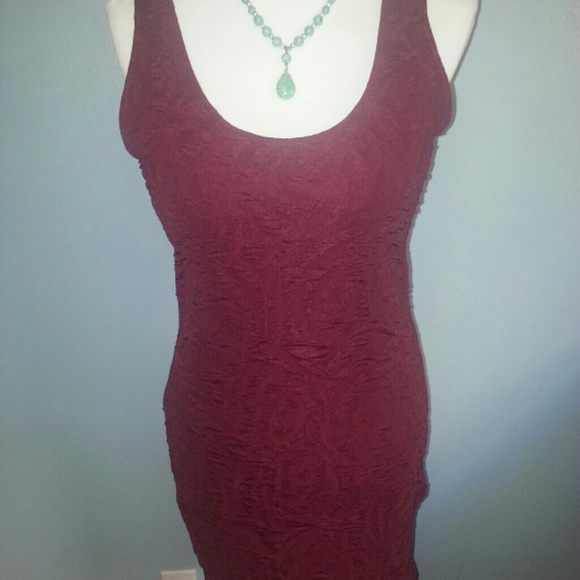 Form fitting mauve stretchy dress medium in size