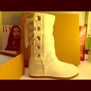Cream colored UGG Boot