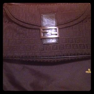 Classy black vintage Fendi clutch.