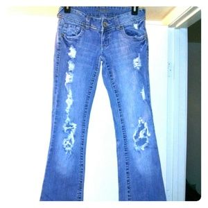 Amethyst. Style blue torn jeans