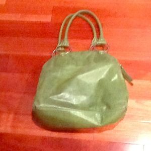 Green leather latico handbag with three sections
