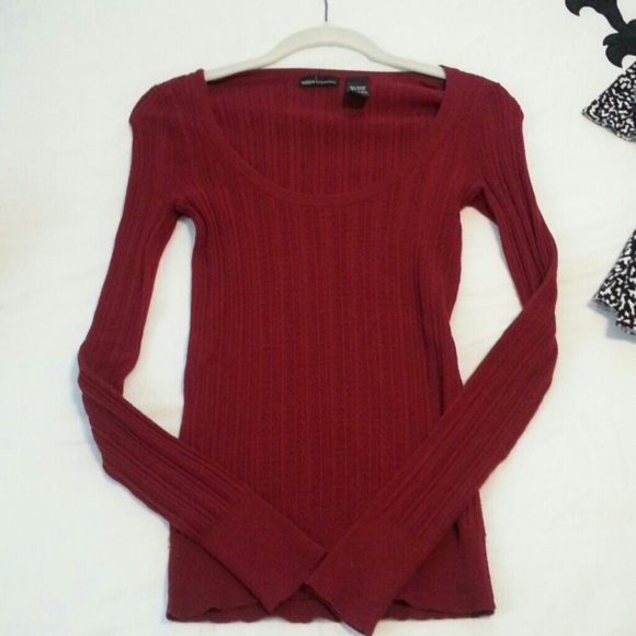 Deep, low cut scoop neck, holiday red sweater