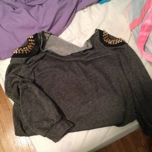 Cute top with studded shoulders!