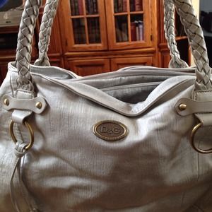 Gray/silver bag. 2 straps. 3 sections